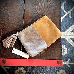 Silver/Camel leather tassel clutch.
